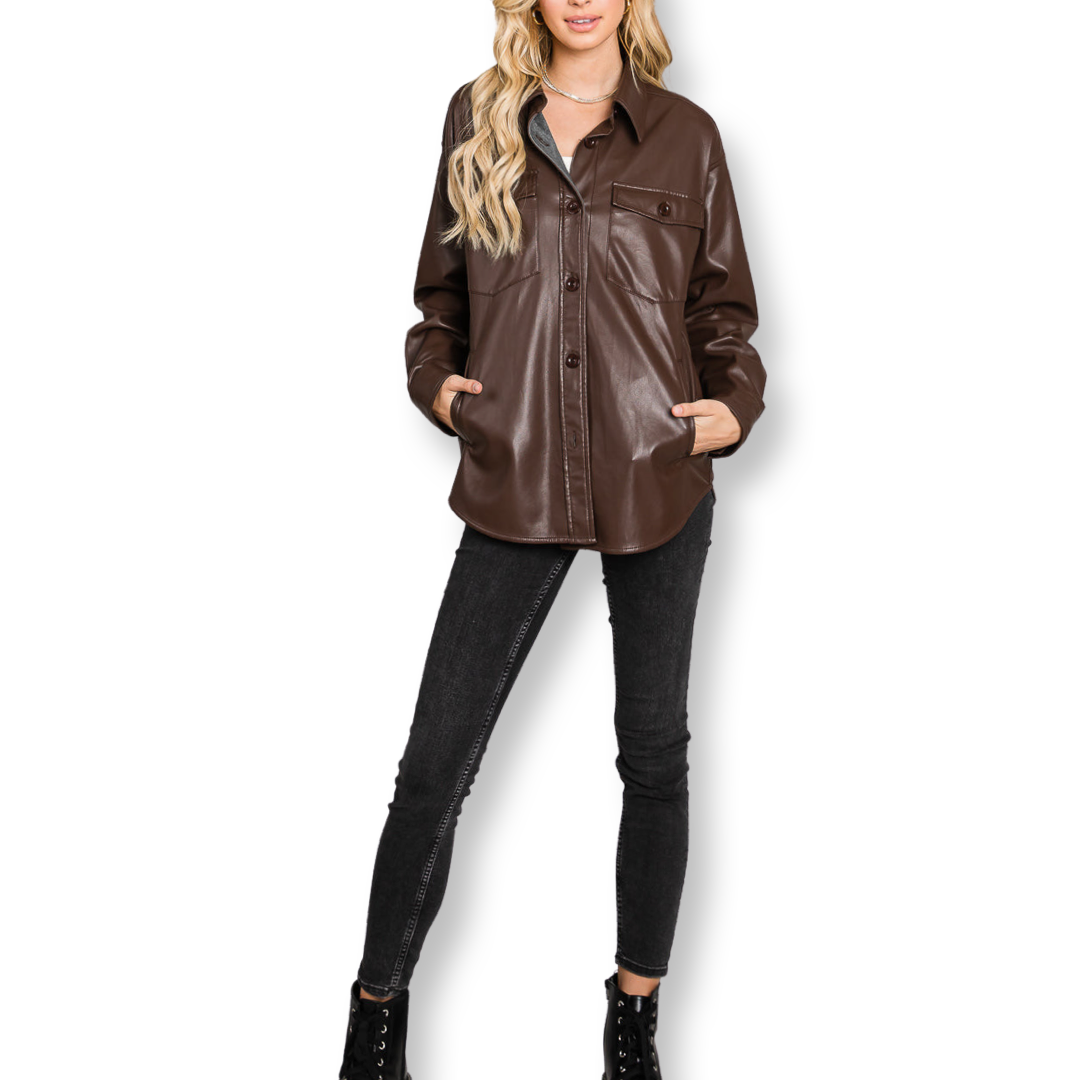 Introducing our Buttery Soft faux leather oversized shirt.  This luxurious piece is made from the finest quality faux leather, and is the perfect third piece. The Chocolate brown color is perfect for any outfit, and the 100% Polyurethane construction ensures that this jacket will stand up to wear and tear. 