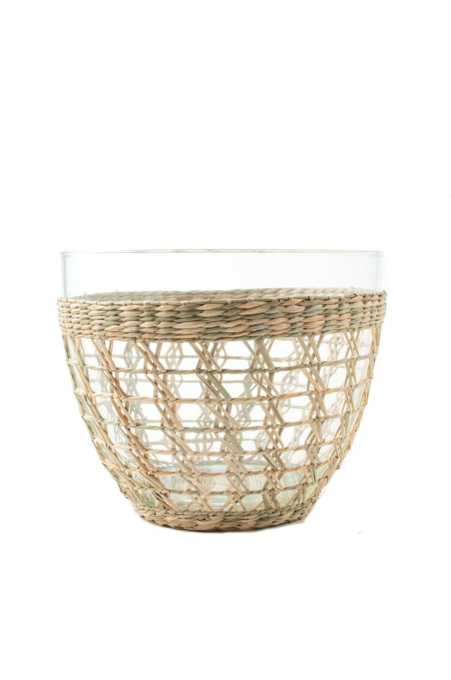 Looking for a fresh, classic look for your next dinner party or backyard barbecue? Check out our Seagrass Cage Salad Bowl! This beautiful bowl is crafted from recycled glass and features a natural seagrass wrap. It's perfect for serving salads, fruit, or even just using as decoration. Whether you're entertaining indoors or out, this bowl is sure to impress your guests.