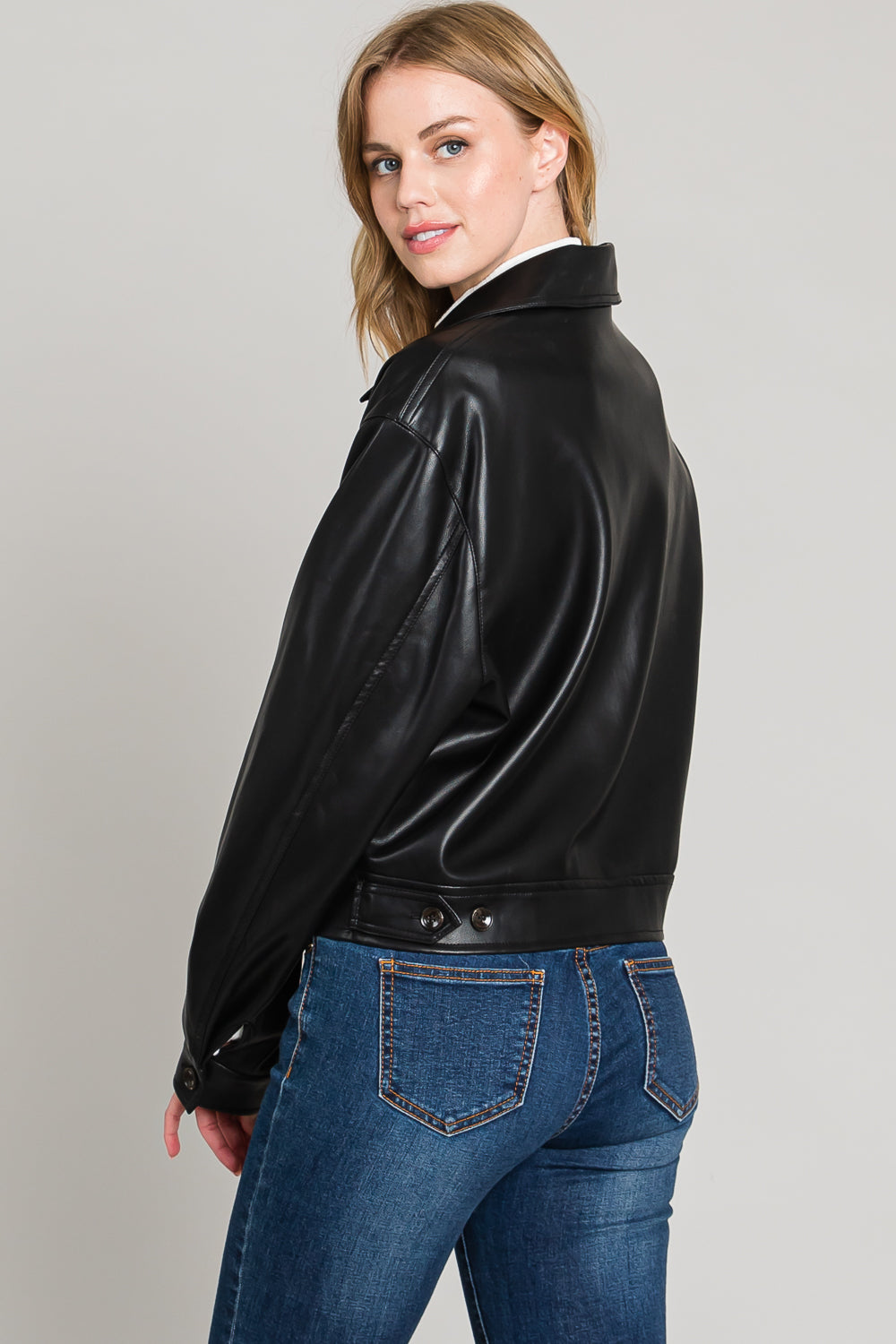 Soft Faux Leather zip front Moto Jacket! This gorgeous jacket is crafted from buttery soft faux leather that feels amazing to the touch. It's also super comfortable and just warm enough, making it perfect for those chilly autumn days and nights. Add a little edge to your outfit with this must-have jacket!